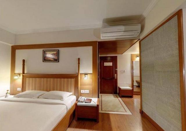 Parijatha Gateway Hotell Bangalore Rum bild